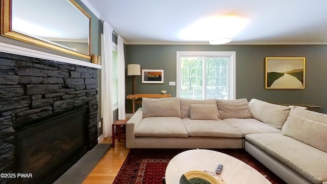 401 Log Tavern Rd, Milford, PA 18337 - living area with wood finished floors, a fireplace, and ornamental molding