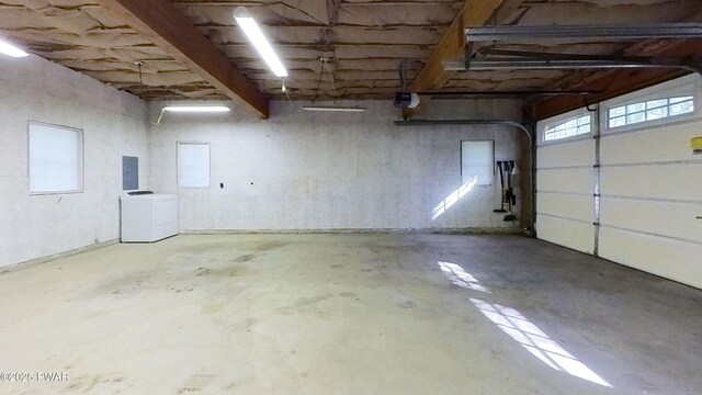401 Log Tavern Rd, Milford, PA 18337 - garage featuring separate washer and dryer, electric panel, and a garage door opener