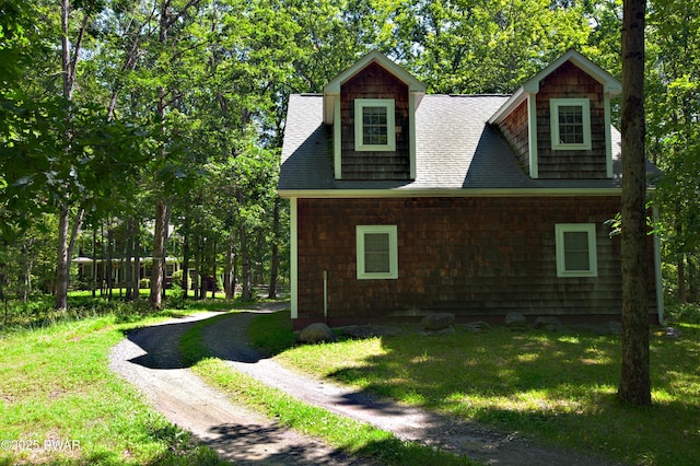 401 Log Tavern Rd, Milford, PA 18337 - view of side of home with roof with shingles and a lawn