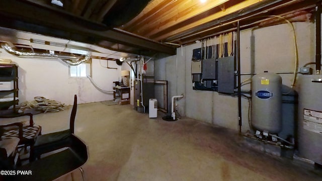 401 Log Tavern Rd, Milford, PA 18337 - basement with a water pressure tank, water heater, electric panel, and heating unit