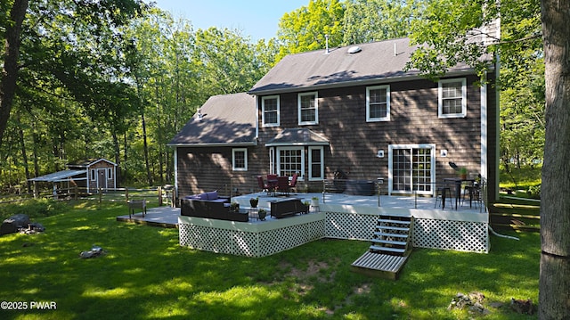 401 Log Tavern Rd, Milford, PA 18337 - back of property featuring a yard, a deck, an outbuilding, and roof with shingles