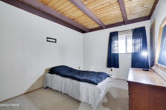 carpeted bedroom with beam ceiling, wooden walls, wood ceiling, and baseboard heating