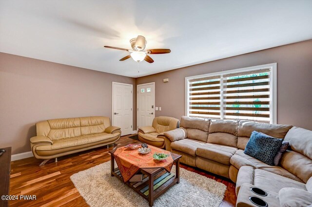 1412 Woodview Ter # 56, Lake Ariel, PA 18436 - living area with a ceiling fan, wood finished floors, and baseboards