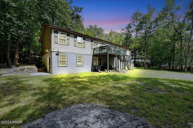 1412 Woodview Ter # 56, Lake Ariel, PA 18436 - rear view of house featuring a deck, stairs, and a yard