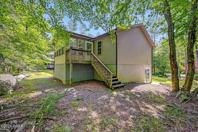 1412 Woodview Ter # 56, Lake Ariel, PA 18436 - back of house featuring stairway and a wooden deck