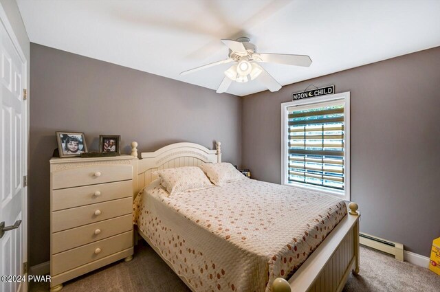 1412 Woodview Ter # 56, Lake Ariel, PA 18436 - bedroom featuring carpet, a baseboard radiator, baseboards, and ceiling fan