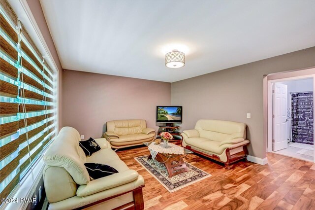 1412 Woodview Ter # 56, Lake Ariel, PA 18436 - living room with light wood-style floors and baseboards