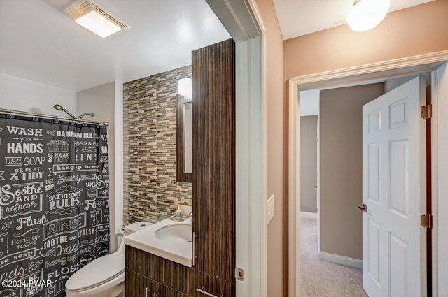 1412 Woodview Ter # 56, Lake Ariel, PA 18436 - bathroom featuring vanity, toilet, and curtained shower