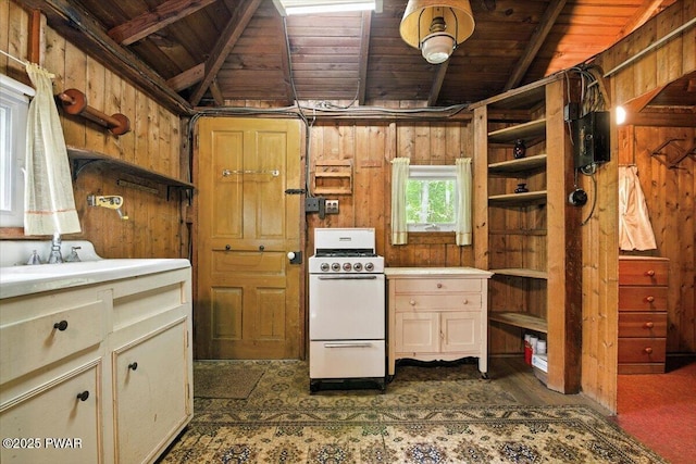 193 Old Rte 402, Dingmans Ferry, PA 18328 - kitchen featuring white gas stove, wood ceiling, wood walls, open shelves, and light countertops