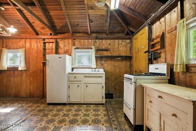 193 Old Rte 402, Dingmans Ferry, PA 18328 - kitchen with white appliances, wood ceiling, wooden walls, healthy amount of natural light, and light countertops