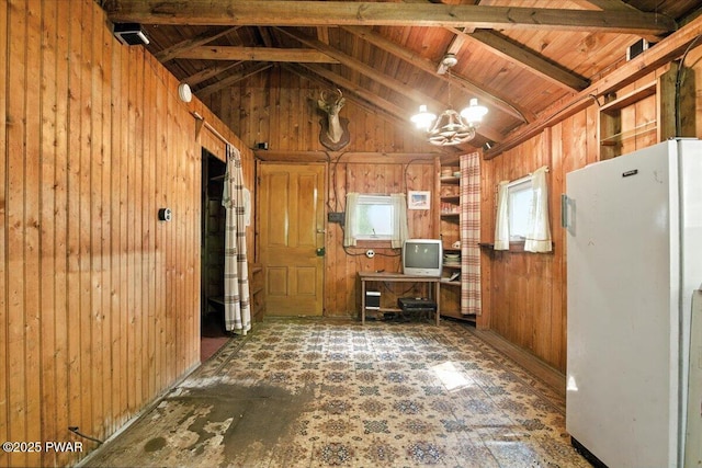 193 Old Rte 402, Dingmans Ferry, PA 18328 - kitchen featuring freestanding refrigerator, wood walls, a chandelier, and wooden ceiling
