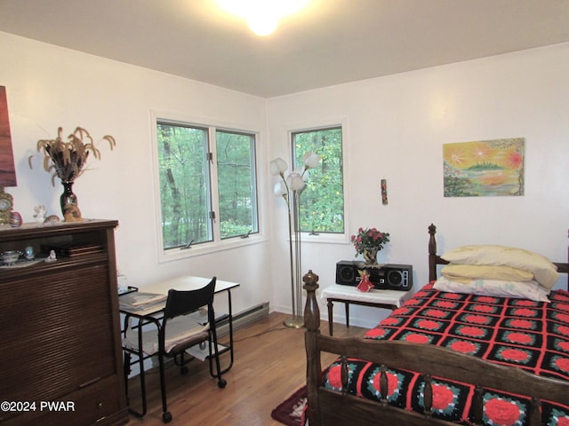 bedroom with wood-type flooring