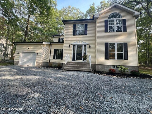 view of front of home with a garage