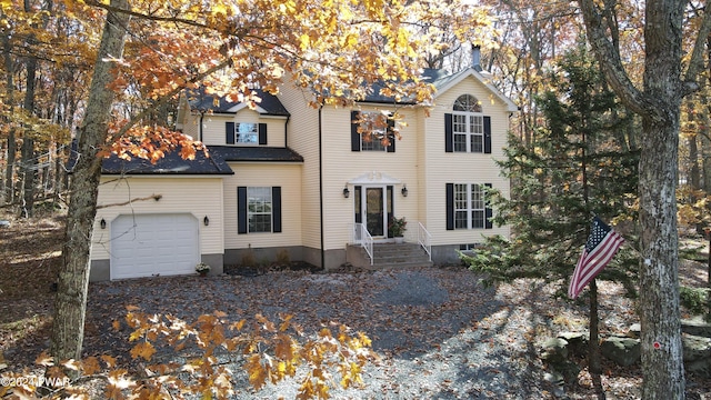 view of front of property with a garage