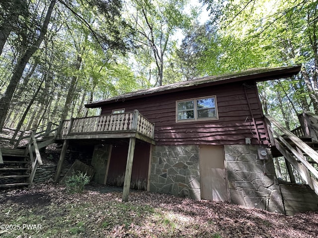 77 Deerfoot Rd, Lake Ariel, PA 18436 - back of property with stairway and a deck