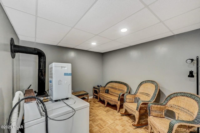 laundry room with laundry area, recessed lighting, and baseboards