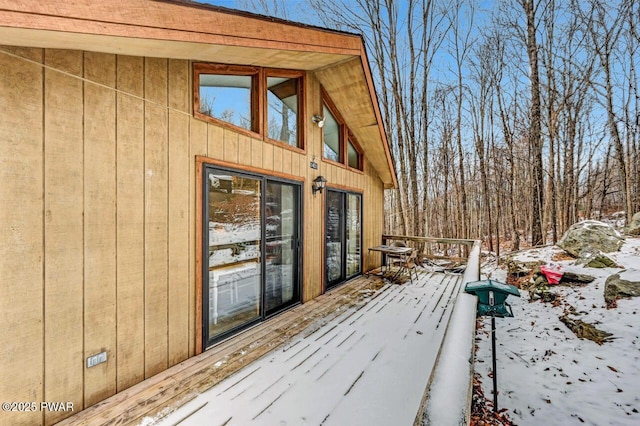 view of snow covered deck