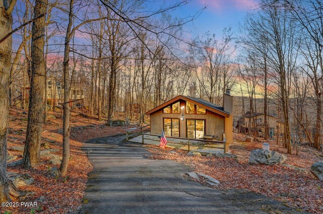 139 Ridgeview Dr, Lake Ariel, PA 18436 - view of front of home with a chimney and driveway