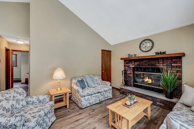 living room featuring baseboard heating, a fireplace, high vaulted ceiling, and wood finished floors