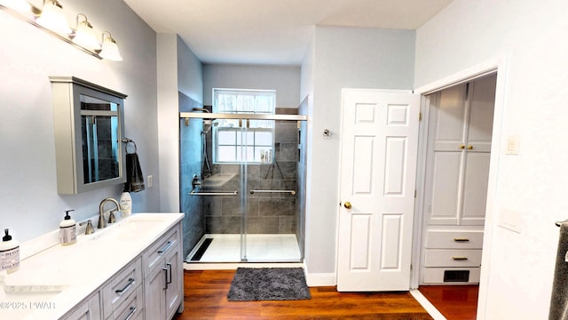 504 St Ives Ct, Bushkill, PA 18324 - bathroom with vanity, wood finished floors, and a shower stall