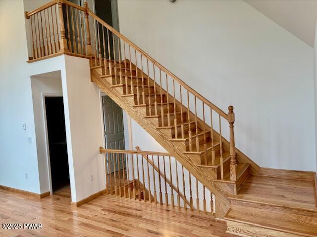 9 Wallenpaupack Dr, Lake Ariel, PA 18436 - stairs with wood finished floors and a high ceiling