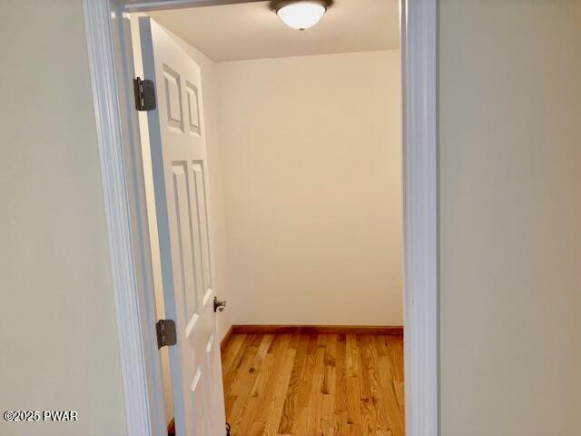 9 Wallenpaupack Dr, Lake Ariel, PA 18436 - hall with light wood-type flooring and baseboards