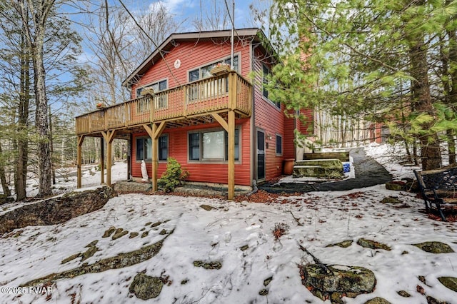 view of property with a wooden deck