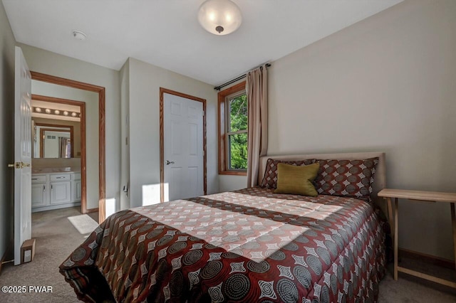 32 Forest Ln, Lake Ariel, PA 18436 - carpeted bedroom featuring baseboards and ensuite bath