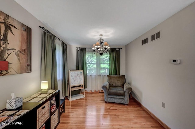 32 Forest Ln, Lake Ariel, PA 18436 - living area featuring a chandelier and light wood-style floors