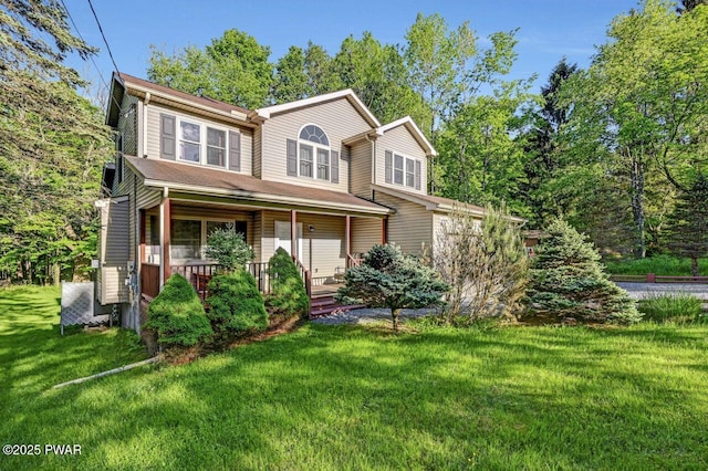 32 Forest Ln, Lake Ariel, PA 18436 - view of front of property with covered porch and a front lawn