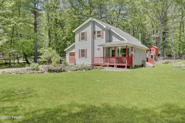 101 Bayberry Dr, Milford, PA 18337 - view of front of house featuring a front lawn and a wooden deck