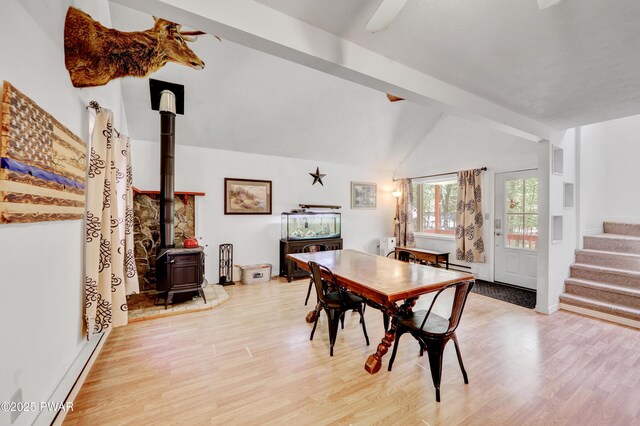101 Bayberry Dr, Milford, PA 18337 - dining room featuring wood finished floors, a wood stove, and stairway