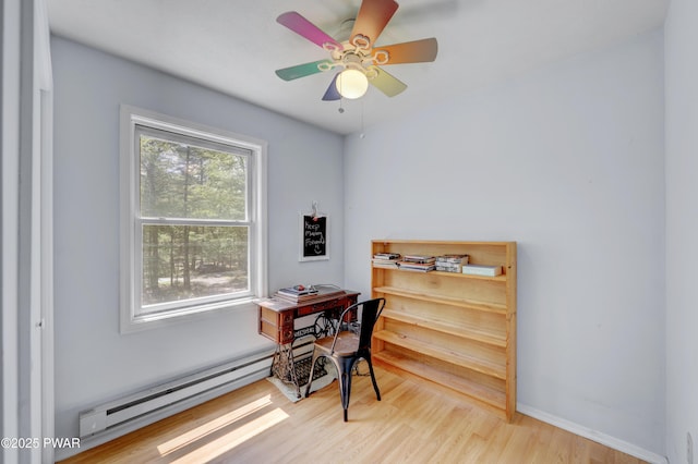 101 Bayberry Dr, Milford, PA 18337 - office space with baseboard heating, wood finished floors, ceiling fan, and baseboards