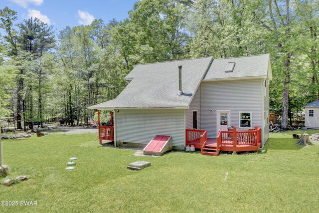 101 Bayberry Dr, Milford, PA 18337 - rear view of house featuring roof with shingles, a deck, a yard, and crawl space