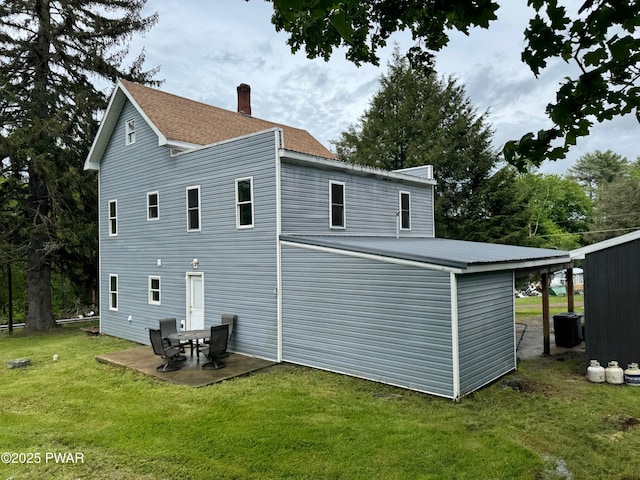 8 Kaiser Strasse, Beach Lake, PA 18405 - back of property with a yard, a chimney, a patio, and roof with shingles