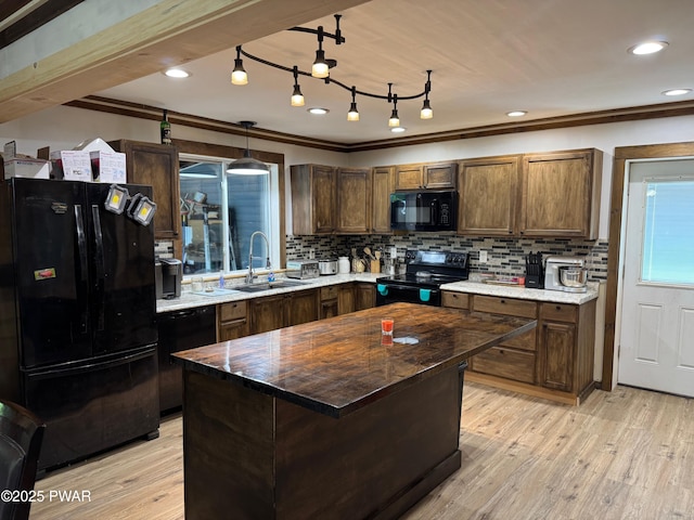 8 Kaiser Strasse, Beach Lake, PA 18405 - kitchen featuring black appliances, a sink, light wood-style flooring, tasteful backsplash, and recessed lighting