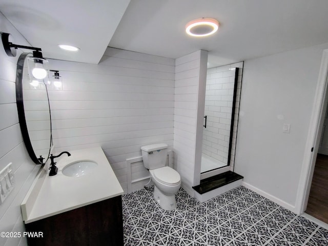 104 Radcliff Rd, Bushkill, PA 18324 - bathroom featuring toilet, vanity, a stall shower, and tile walls