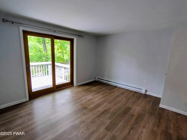 104 Radcliff Rd, Bushkill, PA 18324 - empty room featuring baseboard heating, wood finished floors, and baseboards