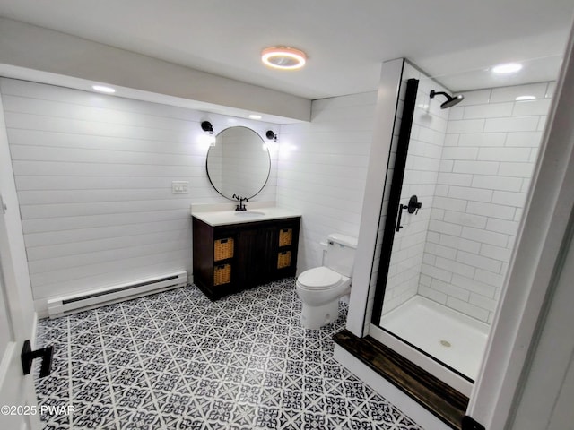 104 Radcliff Rd, Bushkill, PA 18324 - bathroom featuring a baseboard heating unit, vanity, toilet, and a shower stall