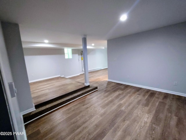 104 Radcliff Rd, Bushkill, PA 18324 - below grade area with wood finished floors, recessed lighting, baseboards, and baseboard heating