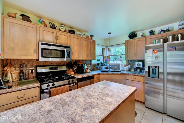 1419 Bear Dr, Bushkill, PA 18324 - kitchen featuring stainless steel appliances, decorative backsplash, light brown cabinets, and light tile patterned floors