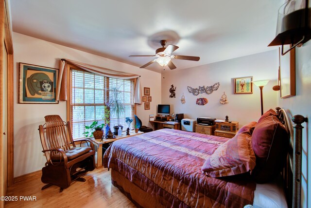 1419 Bear Dr, Bushkill, PA 18324 - bedroom featuring light wood-type flooring, ceiling fan, and an office area