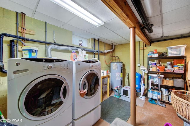 1419 Bear Dr, Bushkill, PA 18324 - washroom featuring electric water heater, washing machine and clothes dryer, and concrete block wall