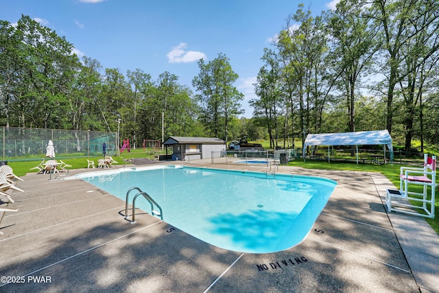 1419 Bear Dr, Bushkill, PA 18324 - community pool with a patio area and view of wooded area