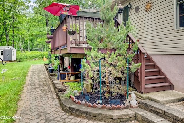 1419 Bear Dr, Bushkill, PA 18324 - view of green lawn with stairs and a storage unit