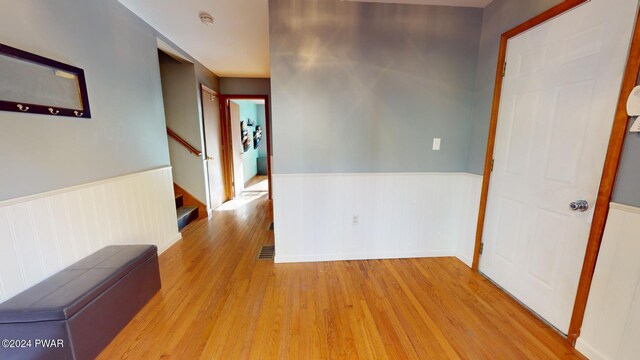 corridor featuring light wood-type flooring