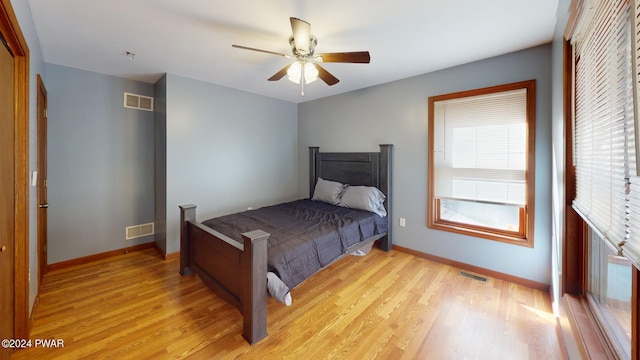 bedroom featuring ceiling fan and light hardwood / wood-style floors