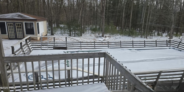 view of snow covered deck