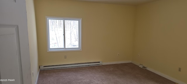 carpeted empty room with baseboards, a baseboard heating unit, and a wealth of natural light