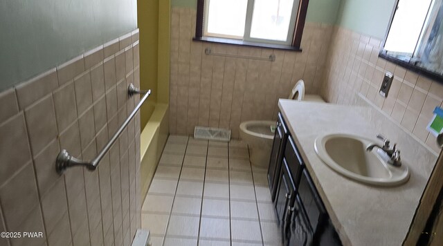 full bathroom featuring visible vents, toilet, tile patterned flooring, vanity, and tile walls